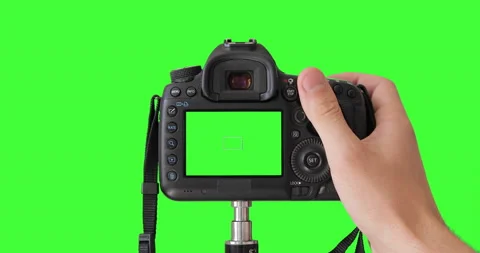 Professional digital camera. Keyed chroma key background.  Stock Footage 136559325