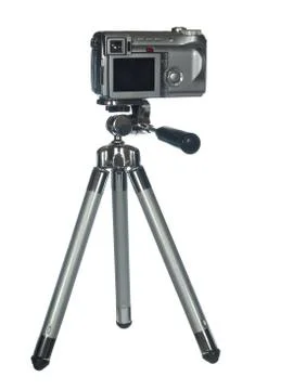 Professional digital camera on a tripod , isolated on white background Stock Photos