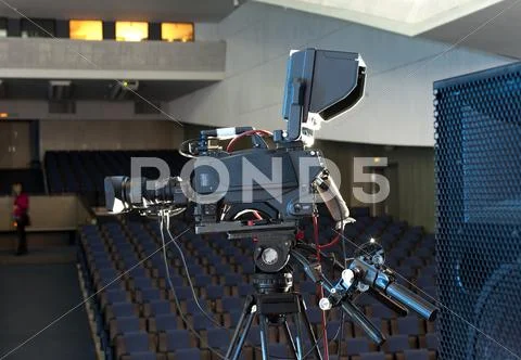 Professional Digital Video Camera. Tv Camera In A Concert Hal.