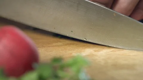 Professional dill cutting with a chef's knife on a cutting board Stock Footage 76960513