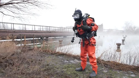 Professional diver in red diving equipment. Stock Footage 115794466