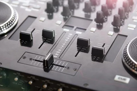 Professional DJ Console with blurred background Stock Photos