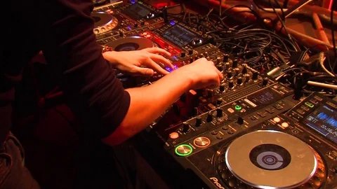 Professional Dj Makes Moves With Hands and mixing music Stock Footage 70503642