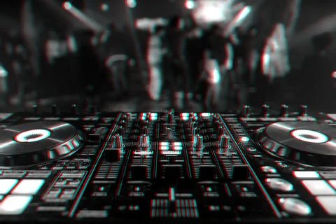 Professional DJ mixer controller for mixing music in a nightclub Stock Photos