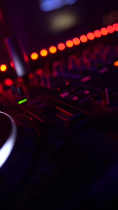 Professional dj mixer turntable controller at nightclub party Stock Footage 333562927