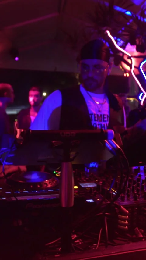 Professional DJ Performing Electronic Music at Nightclub During Live Party Event Stock Footage 337902945