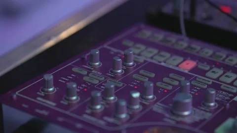 Professional DJ Plays a Beat Sampler with Color Drum Pads Stock Footage 151847064