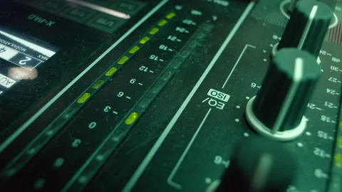 Professional DJ twists knobs to increase level of volume 스톡 동영상 273613244