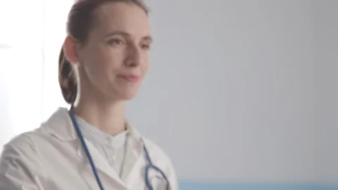 Professional doctor tapping with her finger Stock Footage 128375704