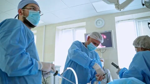 Professional doctors with surgical tools. Group of medical specialists Stock Footage 135886193