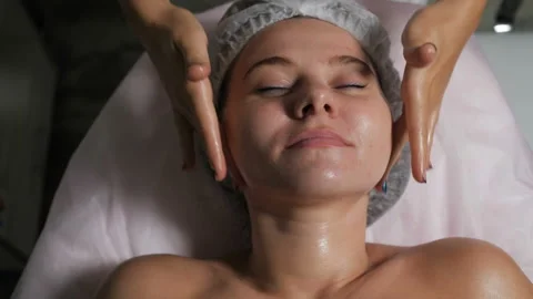 Professional does face massage Stock Footage 96021618