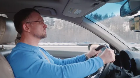 Professional driver drives car at high speed on highway Stock Footage 109437013