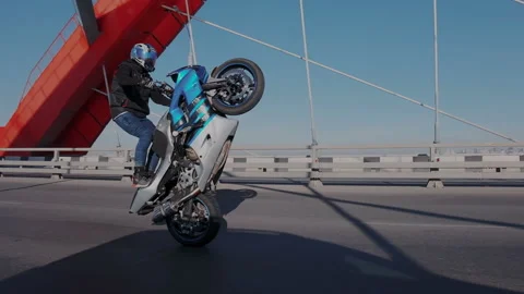 Professional driver risking life, perform dangerous tricks on the back wheel of Stock Footage 105012580