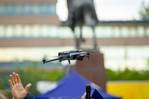 Professional drone with camera is hovering Stock Photos