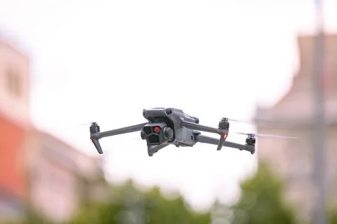 Professional drone with camera is hovering Stock Photos