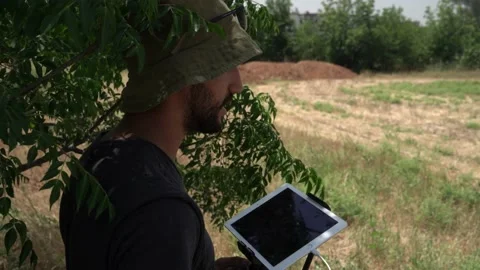 Professional drone pilot or stock photographer prepares a Drone for Flight. Stock Footage 139487289