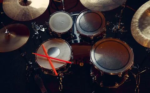 Professional drum kit and sticks closeup, nobody Stock Photos