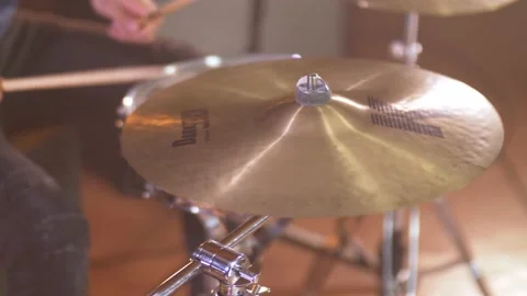 Professional drummer playing a drum roll on a ride cymbal in a studio. Stock Footage 145015209