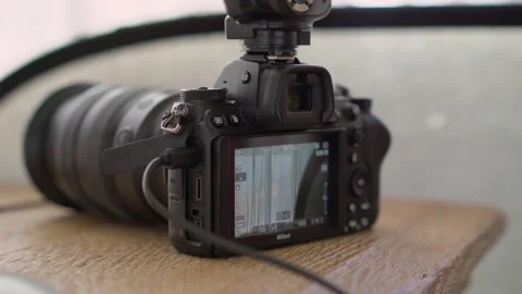 Professional DSLR or mirrorless digital photo camera. Photography equipment tool Vidéo 175962916