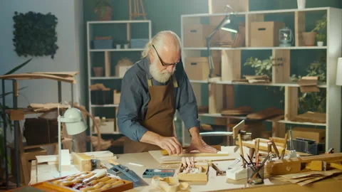 Professional Elderly Man Carpenter Working on Wood Using Carpentry Tools. Hobby Stock Footage 170910069