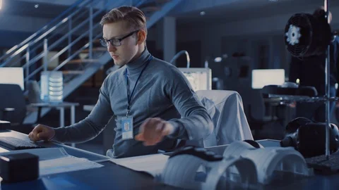 Professional Electronics Development Engineer Working on a Personal Computer Stock Footage 104551458