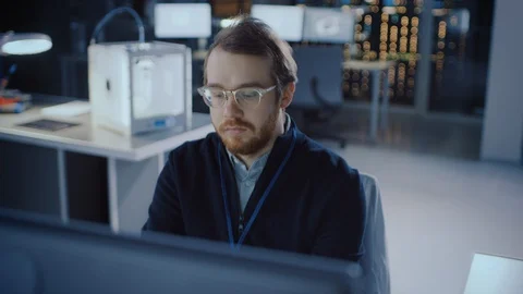 Professional Electronics Development Engineer Working on a Personal Computer Stock Footage 104552996