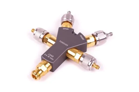 Professional electronics RF VNA calibrator tool isolated on the white backgro Stock Photos