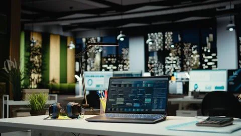 Professional empty office features computers and forecasting equipment Stock Photos