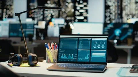Professional empty office features computers and forecasting equipment Stock Photos
