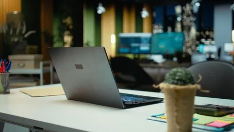 Professional empty office features computers and forecasting equipment Stock Photos