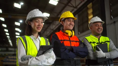 Professional engineer and technician wearing safety helmet analyzing meeting. Stock-Footage 287472772