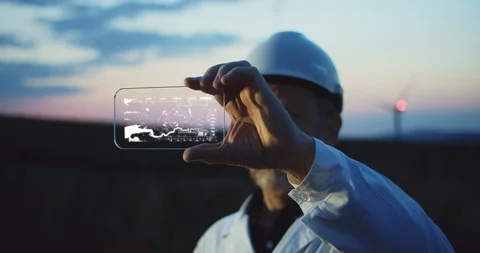 Professional engineer checking information on digital display. Future technology Stock-Footage 129852713