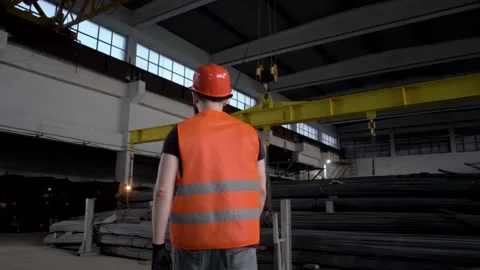 A professional engineer confidently walks around the plant Stock-Footage 135314879