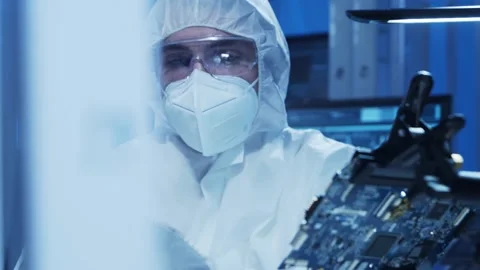 Professional engineer is developing a modern microprocessor in a futuristic Video stock 155699741