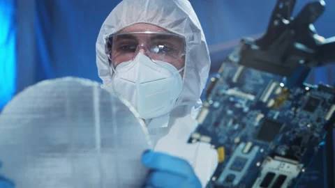 Professional engineer is developing a modern microprocessor in a futuristic Video stock 155986817