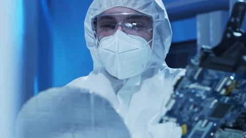 Professional engineer is developing a modern microprocessor in a futuristic Video stock 156203197