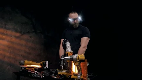 Professional engineer with equipment and tools on black background Stock Footage 151646191