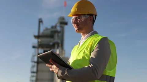 A professional engineer, a heavy industry worker, an inspector dressed in a 스톡 동영상 229357145