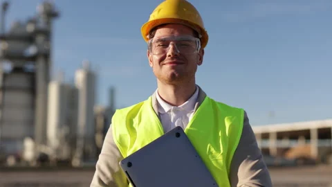 A professional engineer, a heavy industry worker, an inspector dressed in a Stock Footage 278296002