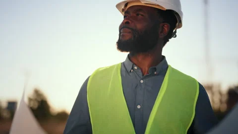 Professional engineer or developer examining drawings of new building, portrait Stock Footage 318710751