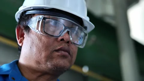 Professional engineer portrait with industrial infrastructure in the background  Stock Footage 335966722