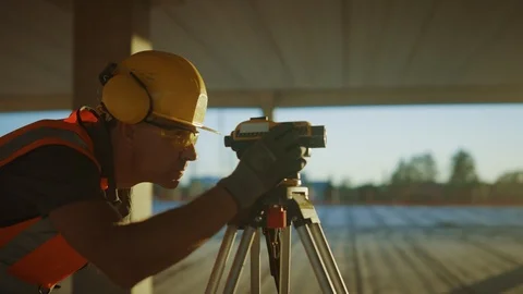 Professional Engineer Surveyor Takes Measures with Theodolite Stock Footage 113335827