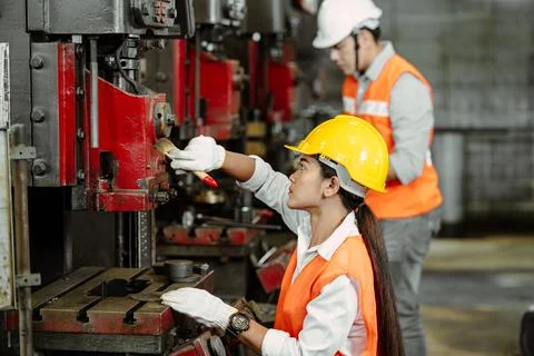 Professional Engineer team workers cleaning service repair old heavy metal .. 写真素材