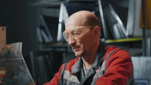 Professional engineer at work. Caucasian man in goggles and uniform. Craftsman Stock-Footage 137282155