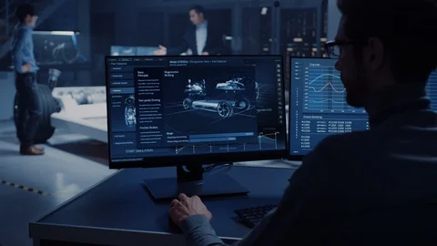 Professional Engineer Works on a Computer with a 3D CAD Software and Tests Stock Footage 105727636