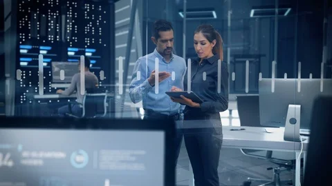 Professional Engineers Analyzing Data on Tablet in High Tech Research Lab Video stock 127138878