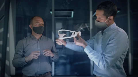 Professional Engineers Working at Modern Facility Wearing Protective Face Masks. Video stock 139304394