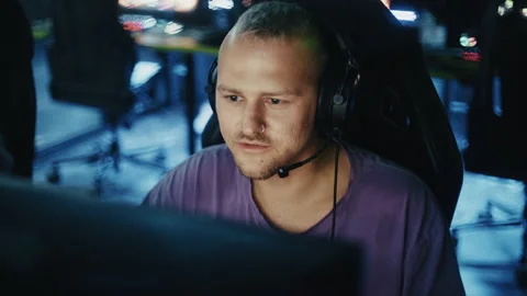 Professional esports gamer playing on a computer Stock Footage 342129730