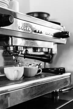 Professional espresso coffee making machine close up in black and white Stock Photos
