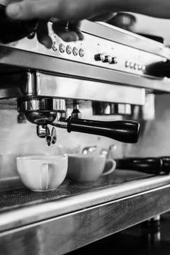 Professional espresso coffee making machine close up in black and white Stock Photos